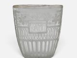 a close up of a glass vase with a pattern on it