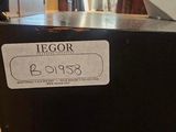 a black box with a label on it sitting on a table