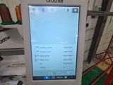 a computer screen that is sitting in a room