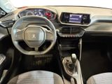 the interior of a car with a steering wheel and dashboard controls
