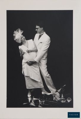black and white photograph of a man and a woman dancing in a dance pose
