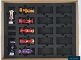 a box that has a bunch of toy cars in it