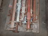 a pile of pipes that are sitting on a pallet
