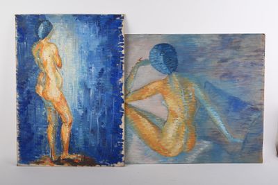 Deux tableaux représentant un homme et une femme sont accrochés au mur.