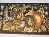 une photo d'un tableau représentant des oiseaux et des fleurs