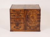 an old wooden chest with drawers and drawers on it