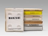 several boxes of cigarettes are stacked on top of each other