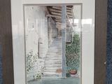 aquarelle encadrée représentant un escalier menant à une maison