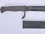 a knife that is laying on a table
