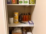 a pantry with a lot of items on the shelves