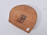 a small piece of wood that has a stamp on it
