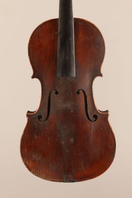 an old violin with a wooden back and bow on a white background