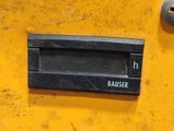 a close up of a button on the side of a machine