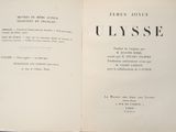 an open book with a picture of a man on it