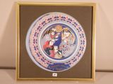 a picture of a plate with a picture of a couple on it