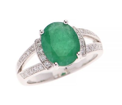 an emerald and diamond ring