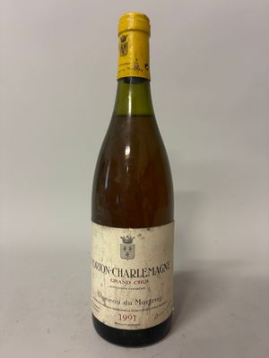 a bottle of wine that is sitting on a table