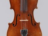 an old violin with a bow on a white background