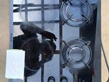 une photo d'une plaque de cuisson équipée de deux feux