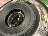 a close up of a camera lens on a table