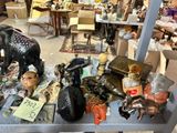 a table with many items on it in a room