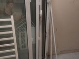 a room with a lot of windows and a radiator in it