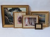 three framed pictures and a picture of a woman in a red dress