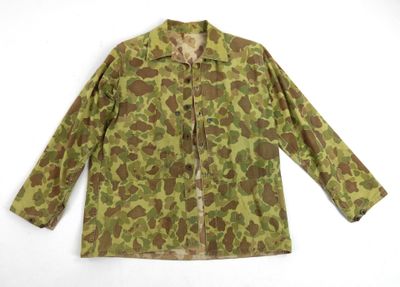 an image of a camouflage jacket on a white background