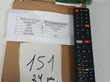 a remote control sitting next to a box with a price tag