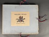 an old book with a picture of a bird on it ' s cover