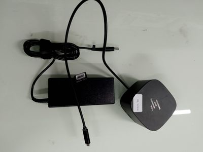 a charger and a power cord attached to a wall