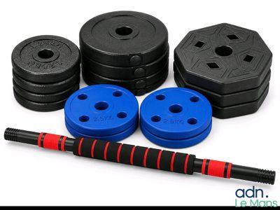 a close up of a set of weights, a barbell and a pair of rubber weights