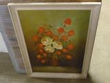 une photo d'un tableau représentant des fleurs dans un vase posé par terre