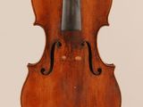 an old violin with a bow on a white background