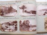 an old photo of a book with pictures of a town