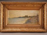 a painting of a river scene in a gold frame