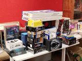 a table with a lot of electronics on top of it