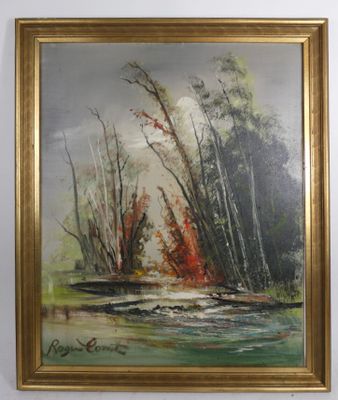 une peinture à l'huile représentant une rivière et des arbres dans un cadre doré