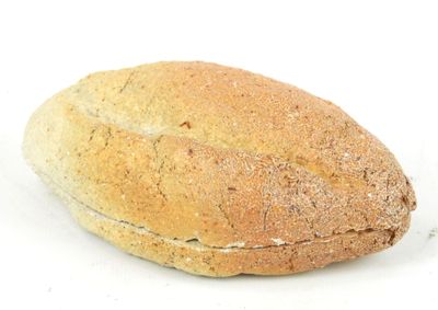 a loaf of bread that is sitting on a white surface