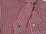 red and white striped dress shirt with a tie on a hanger