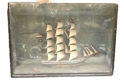 a picture of a ship in a glass case