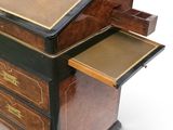 a wooden desk with a drawer on top of it