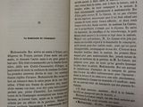 an open book that has a picture of a cat on it