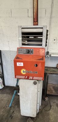 a machine that is sitting inside of a building