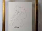 a picture of a drawing of a man in a gold frame