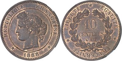 a close up of a coin with an image of a woman on it