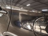 a close up of a car ' s door handle and door handle