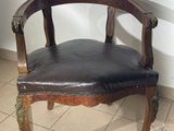 a chair that is sitting on a tile floor