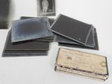 a lot of old photos on a white table