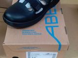 a box with a pair of shoes on top of it